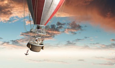 Aerostat içinde seyahat adam. Karışık teknik