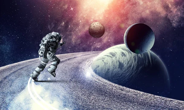 Lopende spaceman en Melkweg. Mixed media — Stockfoto