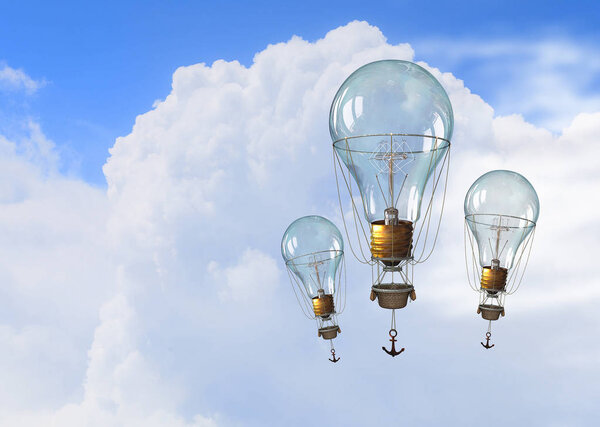 Glass bulb in blue sky. Mixed media