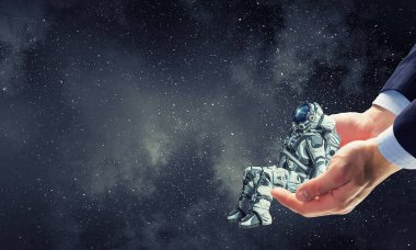 Üstünde parmak uzay adamı. Karışık teknik