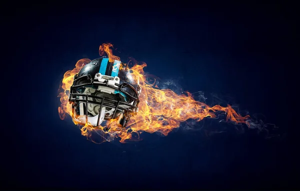 Burning rugby helmet — Stock Photo, Image