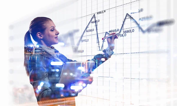 Business lady with tablet draw graphs — Stock Photo, Image