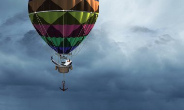 Aerostat içinde seyahat adam. Karışık teknik