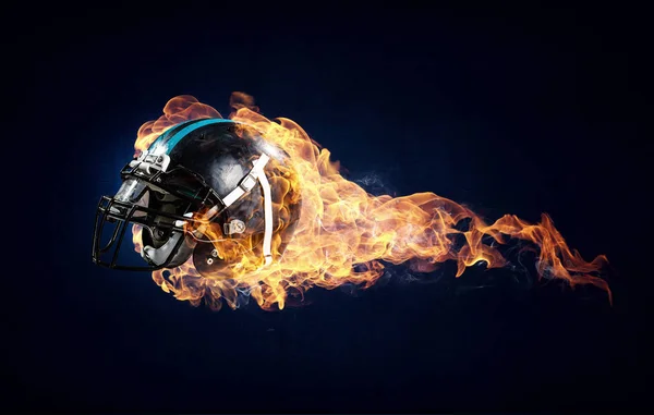 Burning rugby helmet — Stock Photo, Image