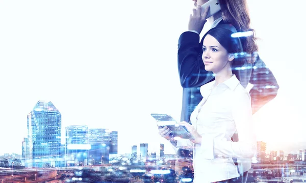 Attractive business lady working on tablet . Mixed media — Stock Photo, Image