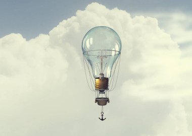 Cam ampul mavi gökyüzünde. Karışık teknik