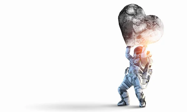 Spaceman carry big planet. Mixed media — Stock Photo, Image