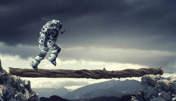 Spaceman running fast. Mixed media — Stock Photo, Image