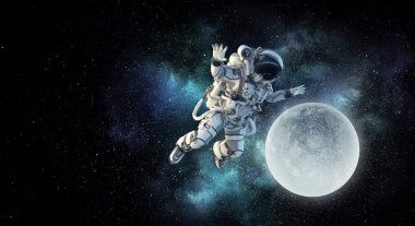 Astronot uzay görevi üzerinde. Karışık teknik