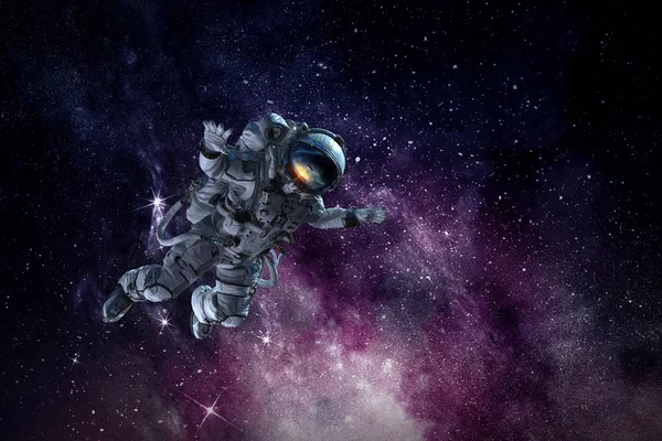 Космонавт на космической миссии. Смешанные медиа — стоковое фото