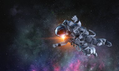 Astronot uzay görevi üzerinde. Karışık teknik