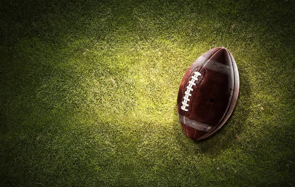 Rugby ball on grass — Stock Photo, Image