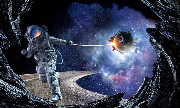 Űrhajós lopni bolygó. Vegyes technika — Stock Fotó
