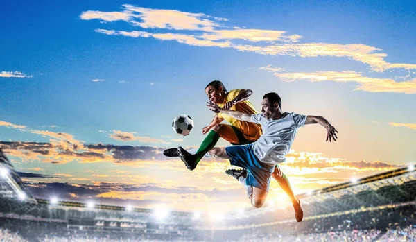 Soccer players at stadium. Mixed media — Stock Photo, Image