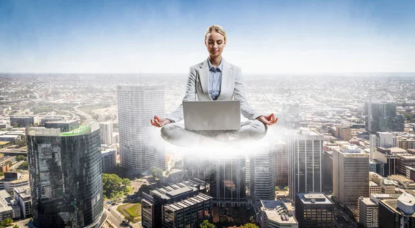 Woman float above city — Stock Photo, Image