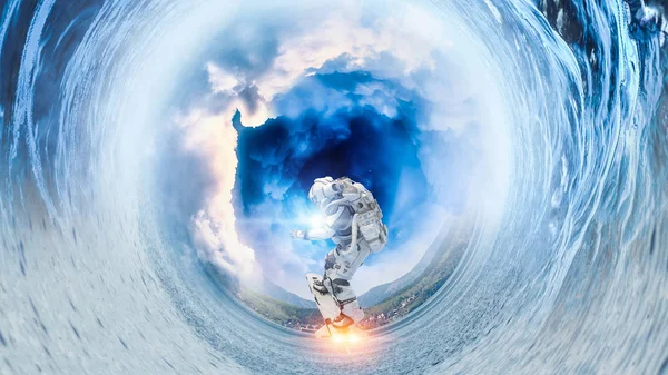 フライング ボード上の宇宙飛行士。ミクスト メディア — ストック写真