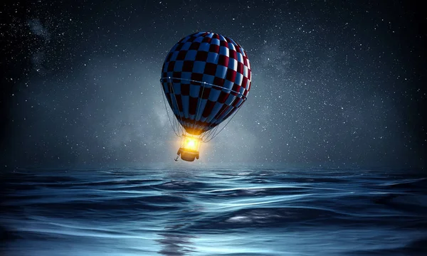 Luftballong över vatten. Mixed media — Stockfoto