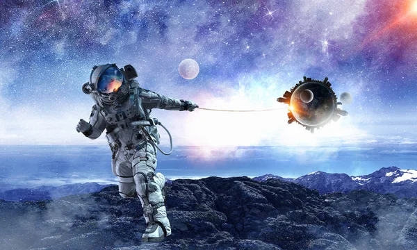 Spaceman stelen planeet. Mixed media — Stockfoto