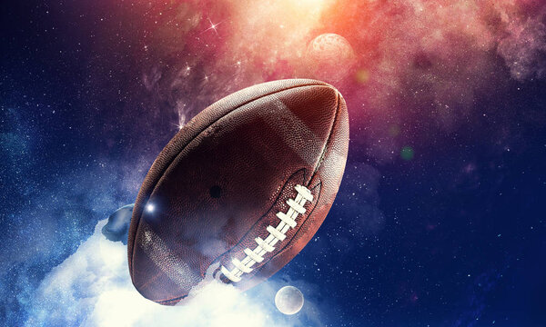 Rugby ball against abstract space purple background