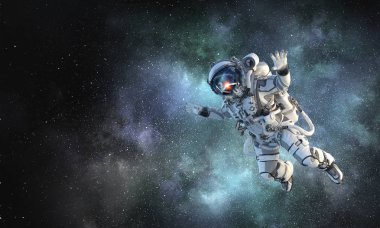 Astronot uzay görevi üzerinde. Karışık teknik