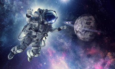Astronot uzay görevi üzerinde. Karışık teknik