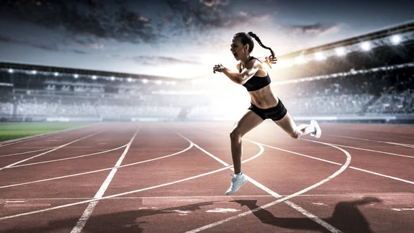 Athlete running race. Mixed media — Stock Photo, Image