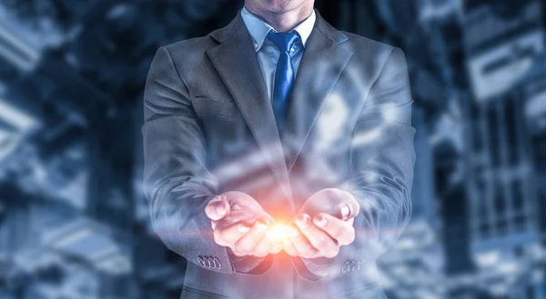 Businessman showing palm. Mixed media — Stock Photo, Image