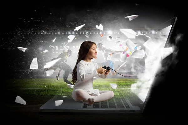 Girl playing video game. Mixed media — Stock Photo, Image