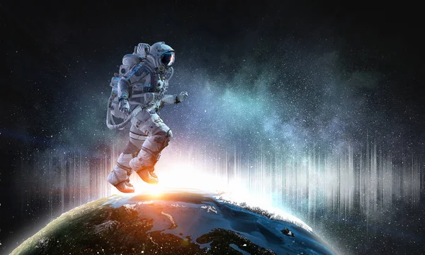 Spaceman igång snabbt. Mixed media — Stockfoto