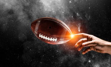 Erkek el parmak spor top ile dokunmadan koyu arka plan üzerinde