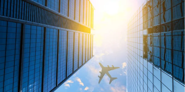 Avião acima da cidade de negócios — Fotografia de Stock