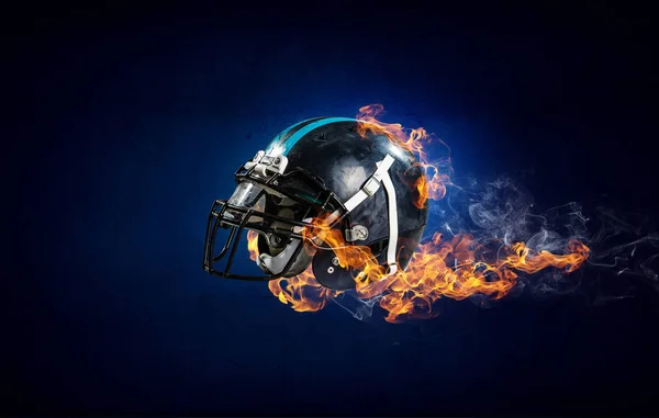 Burning rugby helmet — Stock Photo, Image