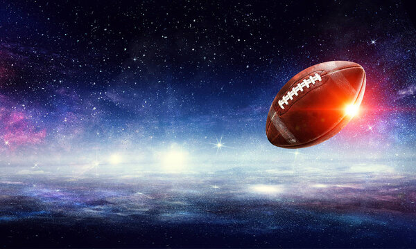 American football ball floating in open space