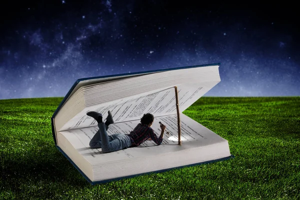 Book that takes you to another reality. Mixed media — Stock Photo, Image