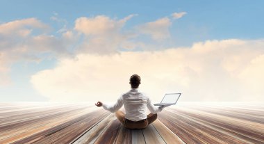 İşadamı lotus poz. Karışık teknik