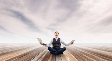 İşadamı lotus poz. Karışık teknik