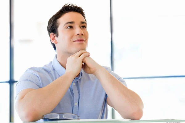 Young man in casual in office — Stock Photo, Image