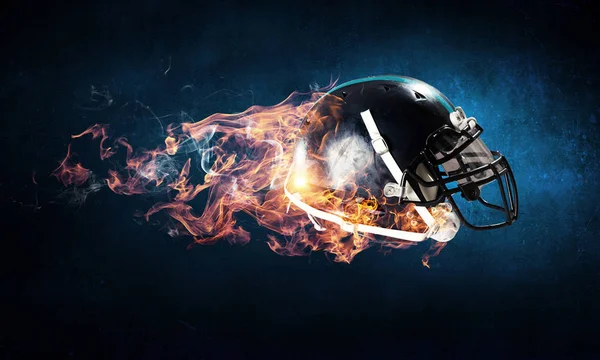 Hořící rugby helma — Stock fotografie