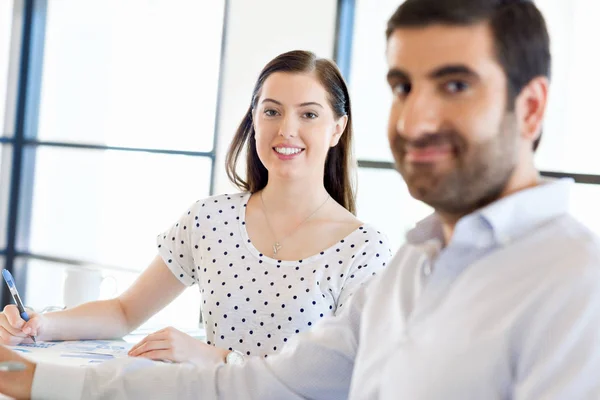 Image of two young business people in office — Stock Photo, Image