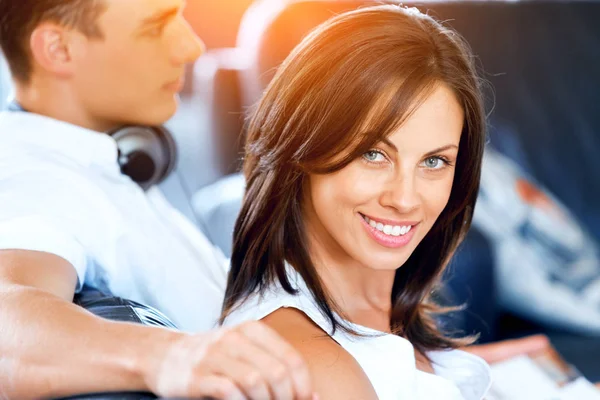 Young couple talking while sitting at home — Stock Photo, Image