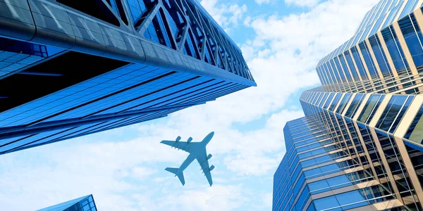 Airplane above business city — Stock Photo, Image