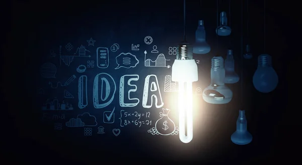 Idea brillante en la oscuridad —  Fotos de Stock