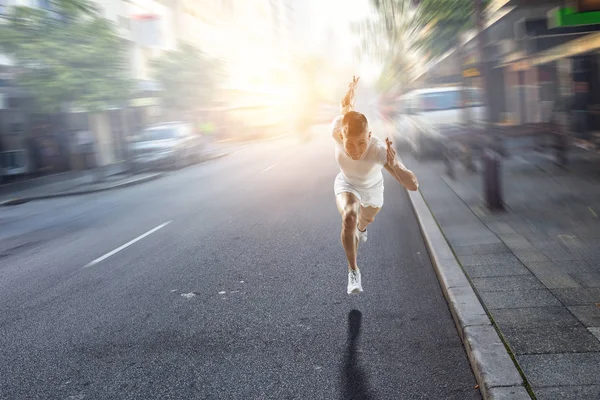 Athlete man running race. Mixed media — Stock Photo, Image