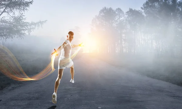 Sporcu adam çalışan yarış. Karışık teknik — Stok fotoğraf