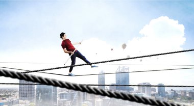Cesur ropewalker kablosu üzerinde. Karışık teknik