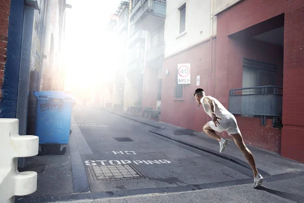 Atleta hombre corriendo carrera. Medios mixtos —  Fotos de Stock