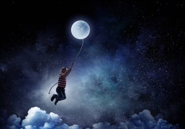 Çocuk ay tutar. Karışık teknik