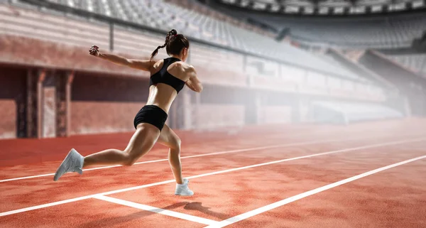 Sportswoman running race. Mixed media — Stock Photo, Image