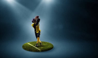 Rugby oyuncusu kaide üzerinde. Karışık teknik