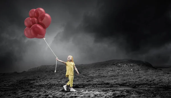 Child with balloons. Mixed media — Stock Photo, Image